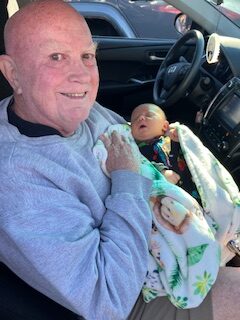 Holding my first great-grandson, Leon.